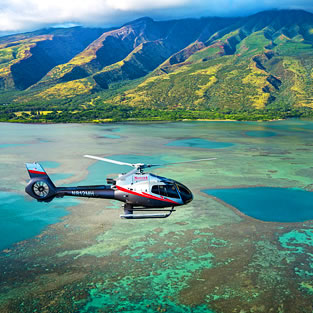 Helicopter flying over Hawaii coast