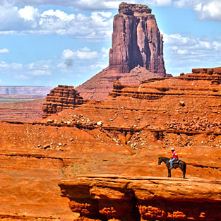 View of Horseback rider at Monument Valley, Arizona