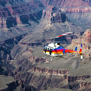View of helicopter over the Grand Canyon North Rim, Arizona