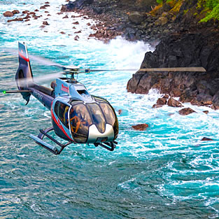 Helicopter flying over Maui's North Coast