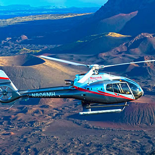 Helicopter flying over Haleakala Volcano